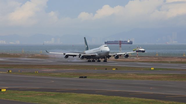 Touchdown first commercial flight Hong Kong International Airport HKG